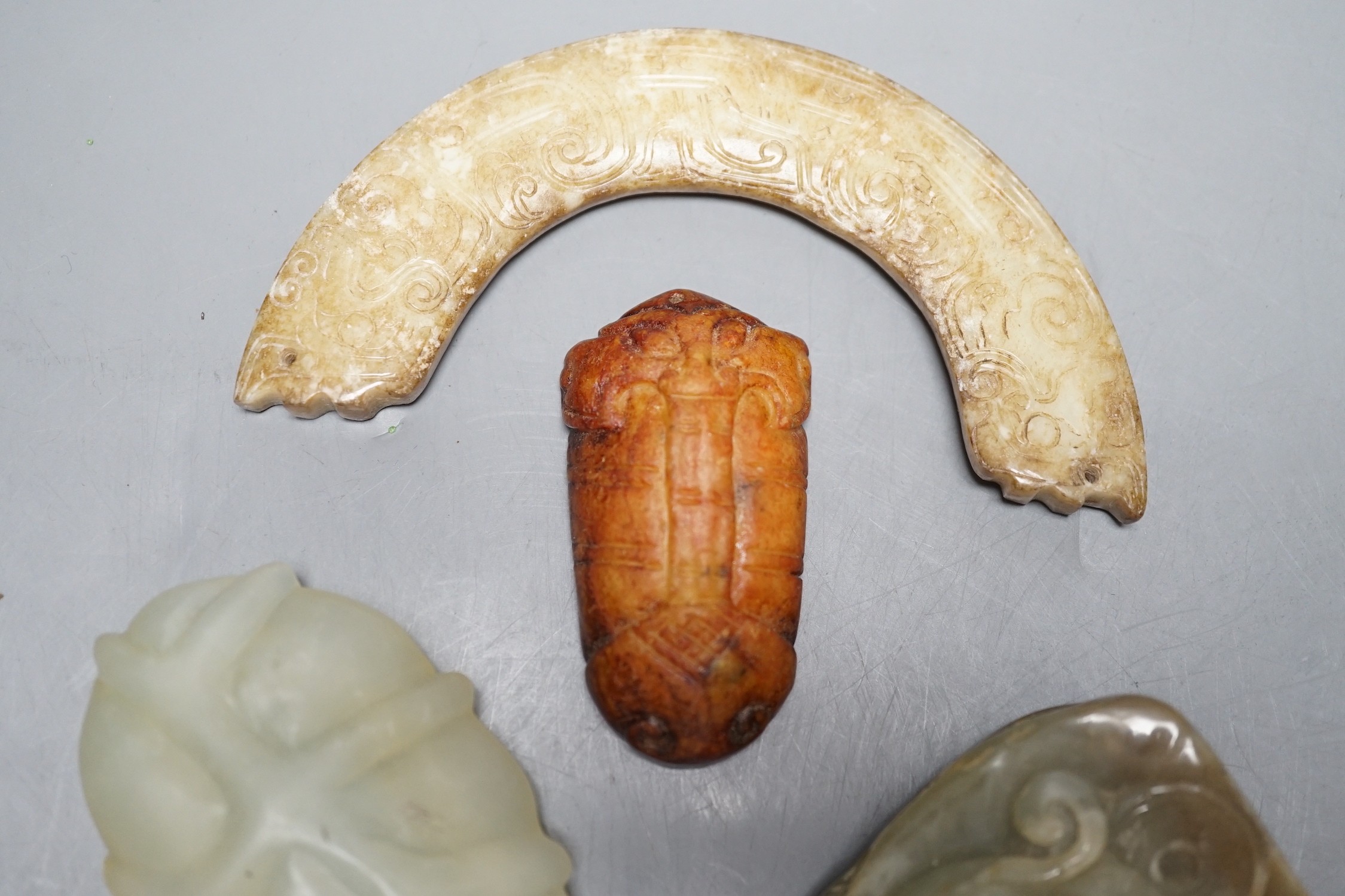 Four Chinese jade carvings, largest 11cm